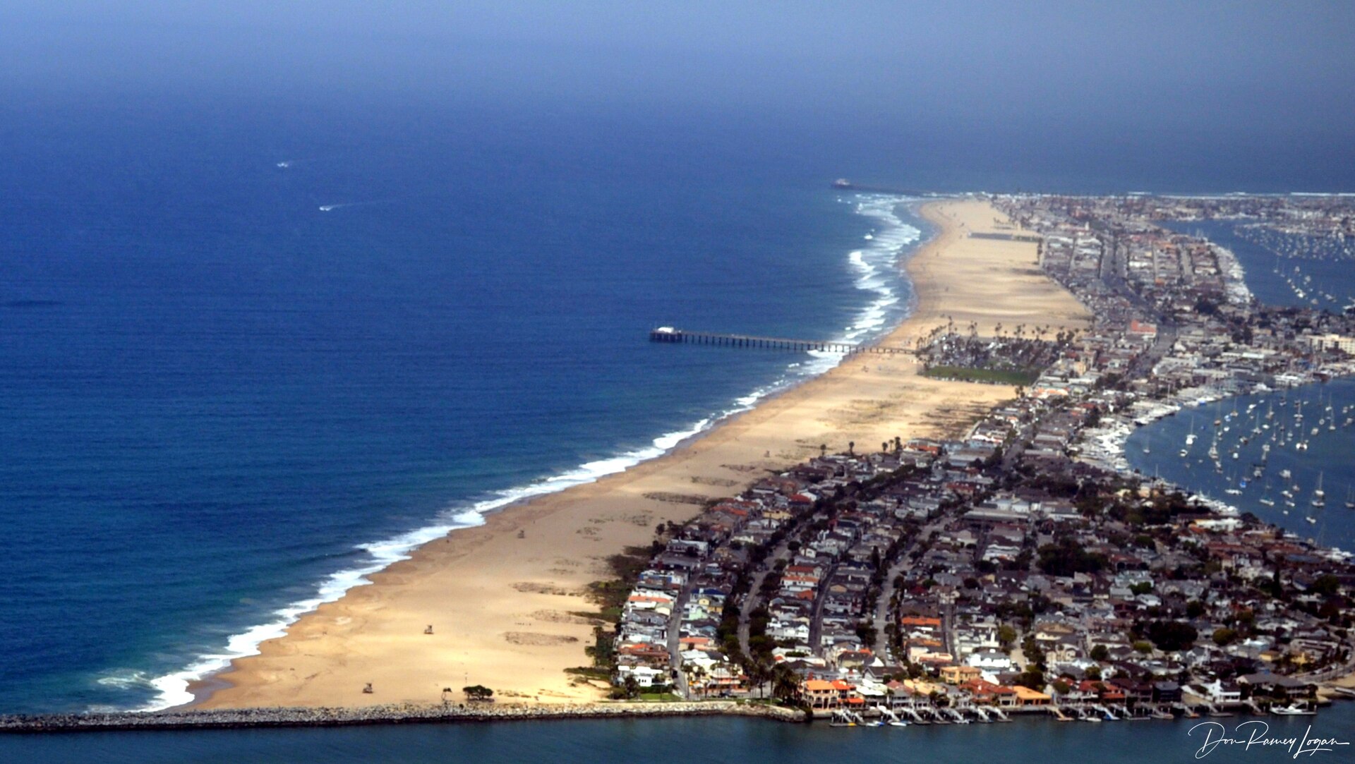 Oceanfront homes along the Balboa Peninsula shoreline in Newport Beach — Mr_Newport real estate